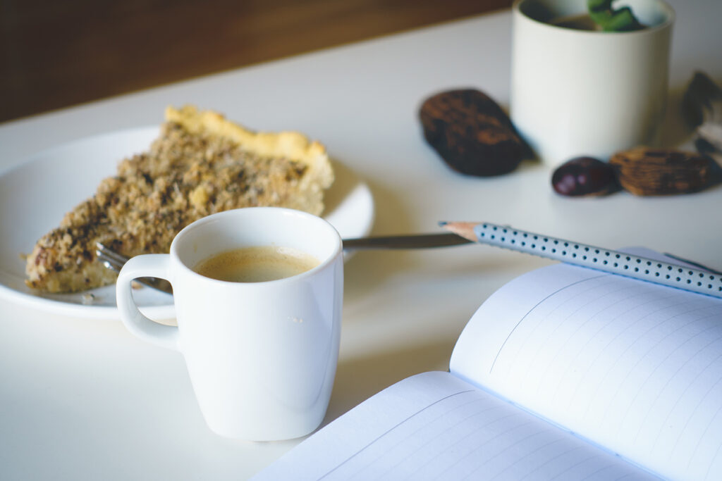 Coffee, Pie, Pencil, and Notebook